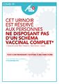 Affichette de l'opération Glue réservant un urinoir à un non-vacciné